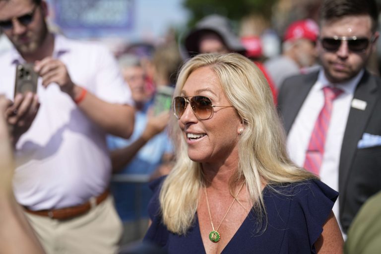 Rep. Marjorie Taylor Greene speaks to people before former President Donald Trump speaks during a rally, Saturday, July 1, 2023, in Pickens, S.C. 