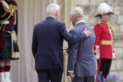 Biden breaks British royal protocol by touching King Charles III on his back