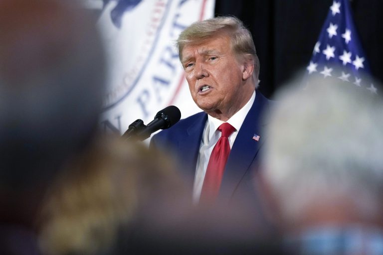 Former President Donald Trump visits with campaign volunteers at the Elks Lodge, July 18, 2023, in Cedar Rapids, Iowa. 