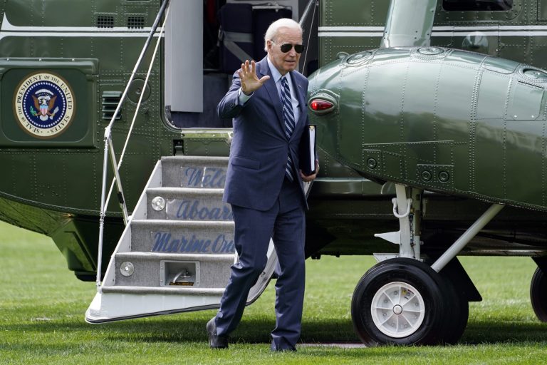 President Joe Biden waves as he arrives on the South Lawn of the White House, Monday, Aug. 14, 2023, in Washington.