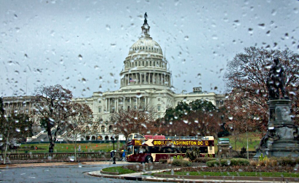 Congressional ethics boss crashes into house, charged with DUI