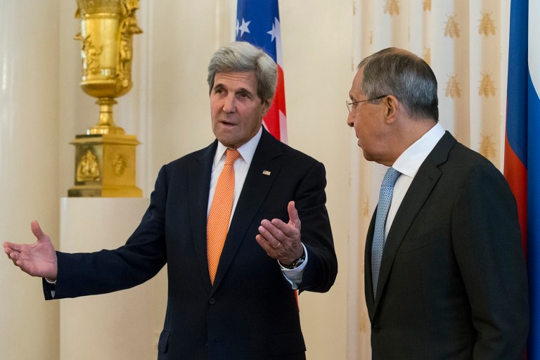 U.S. Secretary of State John Kerry speaks to Russian Foreign Minister Sergey Lavrov during their meeting in Moscow, Russia. The United States is offering Russia a broad new military partnership in Syria. (AP Photo/Alexander Zemlianichenko)