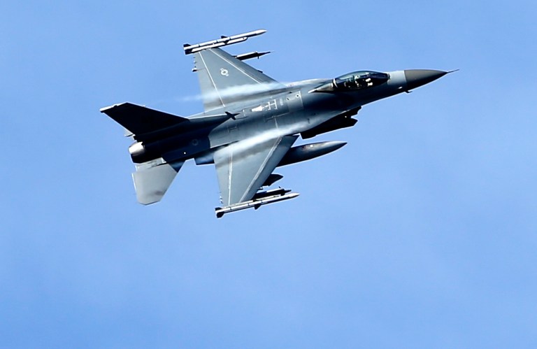 A U.S. plane in Afghanistan was struck by small-arms fire over Afghanistan last week. The F-16 was able to land safely after the incident on Oct. 13, said a Pentagon spokesman.Â (AP Photo/Mindaugas Kulbis)