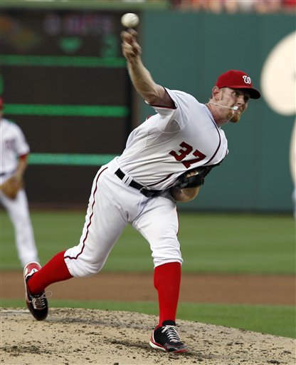 Washington Nationals starting pitcher Stephen Strasburg throws during the third inning against the Tampa Bay Rays. The Nationals won 3-2. (AP Photo)