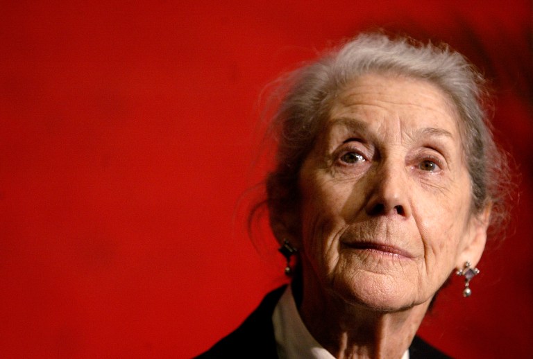 FILE - This is a Sunday, Nov. 26, 2006 file photo of Nobel Prize-winning author Nadine Gordimer, of South Africa,  as she listens to a question during a news conference on the Guadalajara International Book Fair at Guadalajara's Expo  in Mexico. Gordimer died in her sleep in Johannesburg, Sunday July 13, 2014, aged 90. (AP Photo/Guillermo Arias, File)