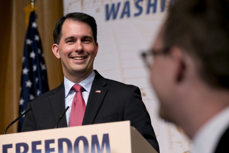 GOP potential presidential candidate Wisconsin Gov. Scott Walker, who is expected to announce his candidacy within the next month, smiles as he speaks during the Road to Majority 2015 convention, Saturday June 20, 2015, in Washington. (AP Photo/Jacquelyn Martin)