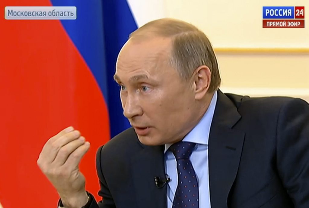 Defiant Putin drops cool demeanor in Ukraine talk