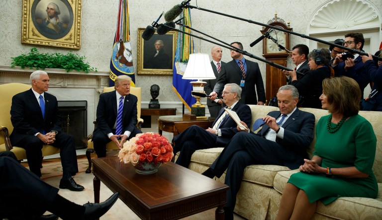 President Trump struck a deal last week with top Democratic and Republican leaders to secure hurricane aid funding and to raise the debt ceiling. (AP Photo/Evan Vucci)
