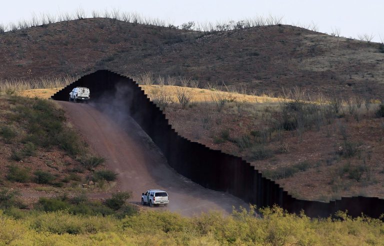 U.S. Border Patrol agents patrolling the border fence along the U.S.-Mexico border. (AP Photo/Ross D. Franklin, file)