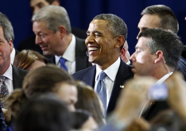 President Barack Obama greets supporters after speaking at McGavock High School on Thursday, Jan. 30, 2014, in Nashville, Tenn. Also pictured is former Vice President Al Gore, behind. (AP Photo/Wade Payne)