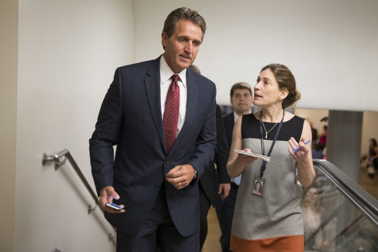 JeffÂ Flake told theÂ Washington ExaminerÂ on Wednesday he won't make up his mind until at least after the Senate holds hearings on the Iran deal. (AP Photo)Â 