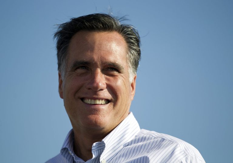 In this June 19, 2012, file photo Republican presidential candidate, former Massachusetts Gov. Mitt Romney campaigns in Holland, Mich. Romney privately raised millions of dollars from New York's elite on Sunday, July 8, 2012, as Democrats launched coordinated attacks.  (AP Photo/Evan Vucci, File)