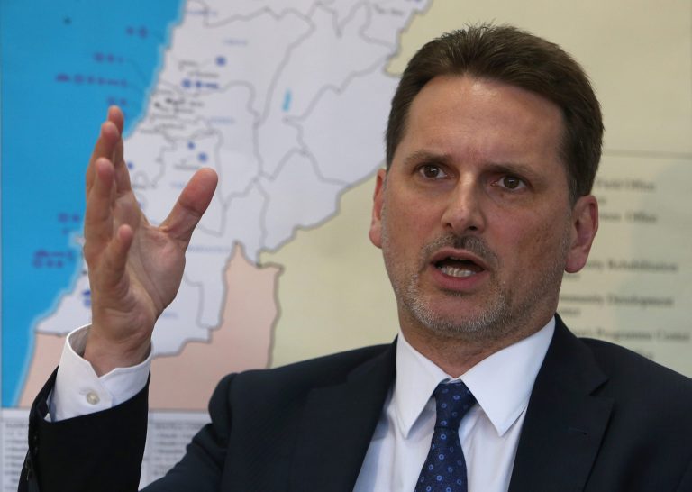 Pierre Krahenbuhl, commissioner-general of the United Nations Relief and Works Agency (UNRWA), speaks during an interview with The Associated Press at UNRWA headquarters in Beirut, Lebanon, Friday, May 16, 2014. The head of the U.N. agency that supports Palestinian refugees said progress has been made in providing food to some 18,000 civilians trapped in the Yarmouk refugee camp in the Syrian capital. But he said an agreement must be struck to also allow in desperately needed medical aid. (AP Photo/Hussein Malla)