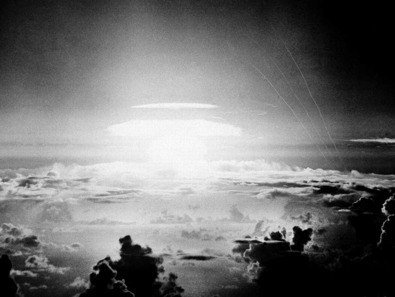 FILE - In this May 21, 1956, file photo, the fireball of a hydrogen bomb lights the Pacific sky a few seconds after the bomb was released over Bikini Atoll. Streamers at right are trails of rockets fired just before the blast for testing purposes. North Korean Foreign Minister Ri Yong Ho said his country may conduct a 