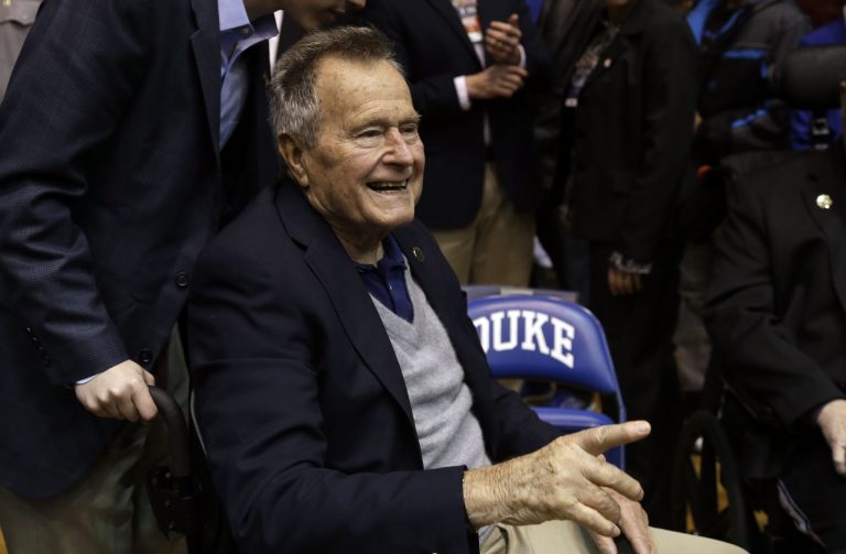 Former PresidentÂ George H.W. Bush admits in his upcoming biography that he disagreed with how his son's administration reacted to the 9/11 terrorist attacks.Â (AP Photo/Gerry Broome)