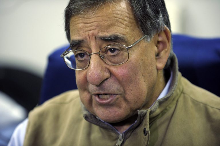   Defense Secretary Leon Panetta talks to reporters while on board his plane headed to Kuwait, Monday, Dec. 10, 2012. Panetta will meet with troops as part of a visit to thank the troops for their service. (AP Photo/Susan Walsh, Pool)  