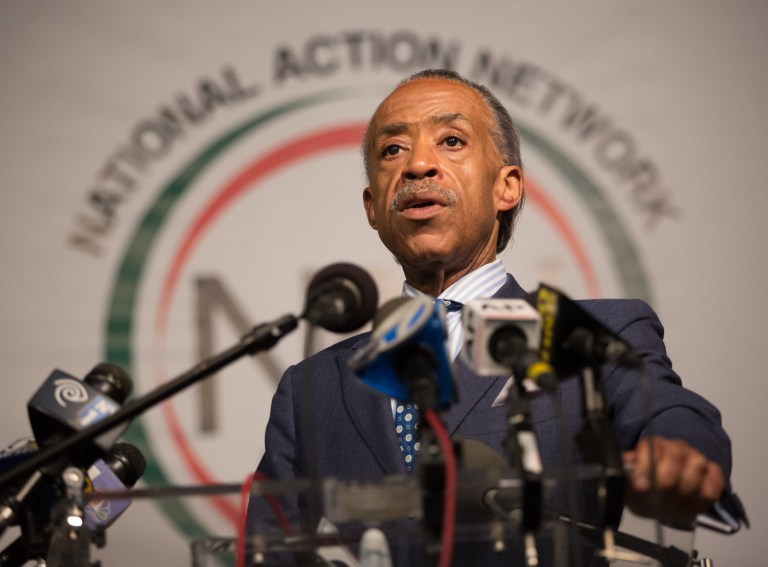 Reverend Al Sharpton speaking at the National Action Network headquarters in New York. (AP Photo/Kevin Hagen)