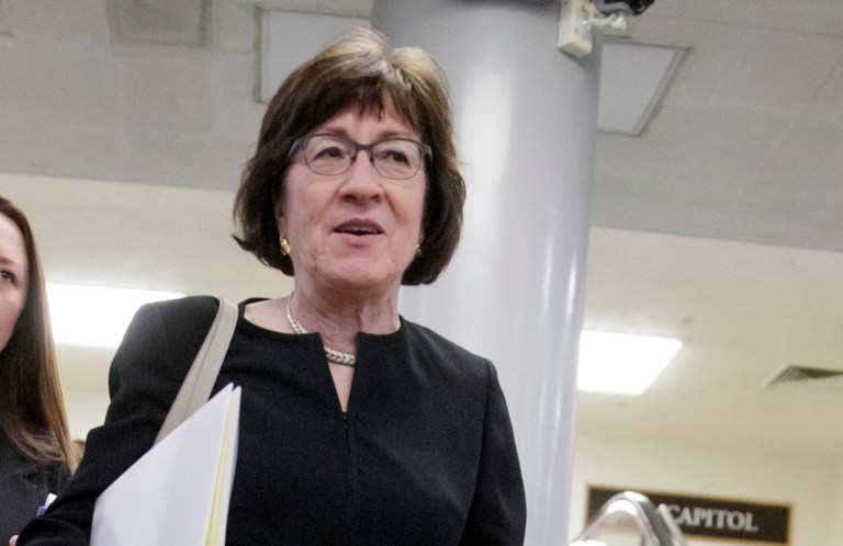 Sen. Susan Collins, R-Maine, and other senators return to their offices on Capitol Hill in Washington, Thursday, March 2, 2017, after votes to confirm two of President Donald Trump's cabinet picks. Retired neurosurgeon Ben Carson was confirmed as secretary of the Department of House and Urban Development on a vote of 58-41. A few hours later, the Senate backed former Texas Gov. Rick Perry to be energy secretary, 62-37. (AP Photo/J. Scott Applewhite)