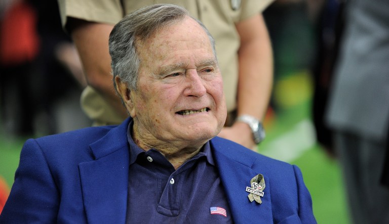 The statement says that Bush has been in a wheelchair for five years and explains that he cannot reach people around the waist. (AP Photo/Eric Christian Smith)