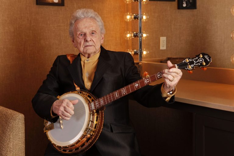 FILE - In this March 11, 2011 file photo Ralph Stanley poses for a photo backstage at the Grand Ole Opry House in Nashville, Tenn. Stanley, the last of the original bluegrass legends arrives Saturday, June 14, 2014, at the Huck Finn Jubilee in Ontario for a rare Southern California appearance that was to be part of a farewell tour, that was until he put his retirement on hold. (AP Photo/Ed Rode, File)