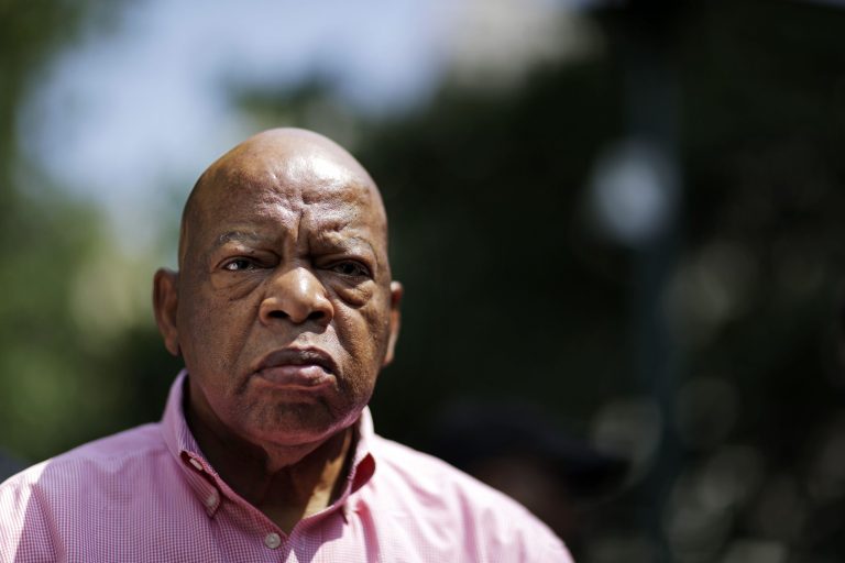 Rep. John Lewis, D-Ga., busted some moves before Jon Ossoff's campaign to take Georgia's 6th Congressional District out of GOP hands went bust itself. The civil rights icon was reacting to an early lead that vanished. (AP Photo/David Goldman)