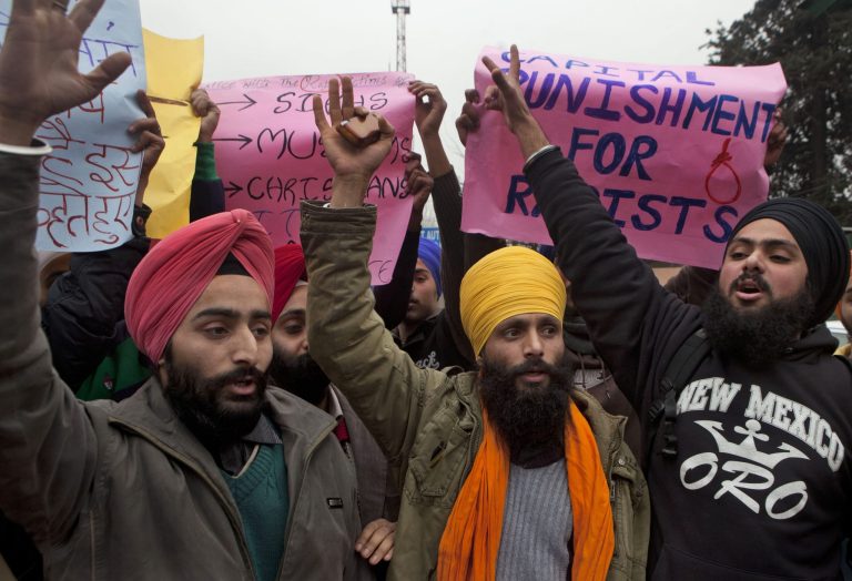   Kashmiri Sikh students protesting against the brutal gang-rape of a woman on a bus last week in New Delhi, shout slogans in Srinagar, India, Thursday, Dec. 27, 2012. Indian Prime Minister Manmohan Singh pledged Thursday to take action to protect the nation's women while the young victim of a gang rape on a New Delhi bus was flown to Singapore for treatment of severe internal injuries. (AP Photo/Dar Yasin)  