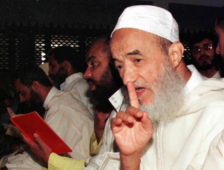   FILE - Morocco's main Islamic leader Abdessalam Yassine gestures in his local mosque during the Friday prayer, in this May 19, 2000 file photo, in Sale, on the outskirts of the Moroccan capital Rabat. The daughter of the founder of Morocco's most powerful religious opposition movement says that her father has died aged 84 on Thursday Dec. 13 2012. (AP Photo/Jalil Bounhar)  