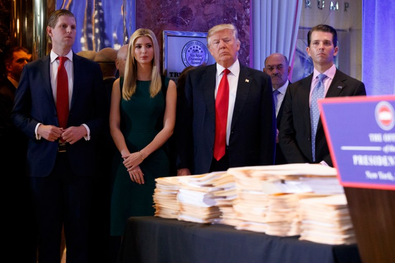 The Trump Organization says it will donate profits from foreign governments to the U.S. Treasury, but that hasn't stopped an emoluments clause lawsuit from being filed. (AP Photo/Evan Vucci)