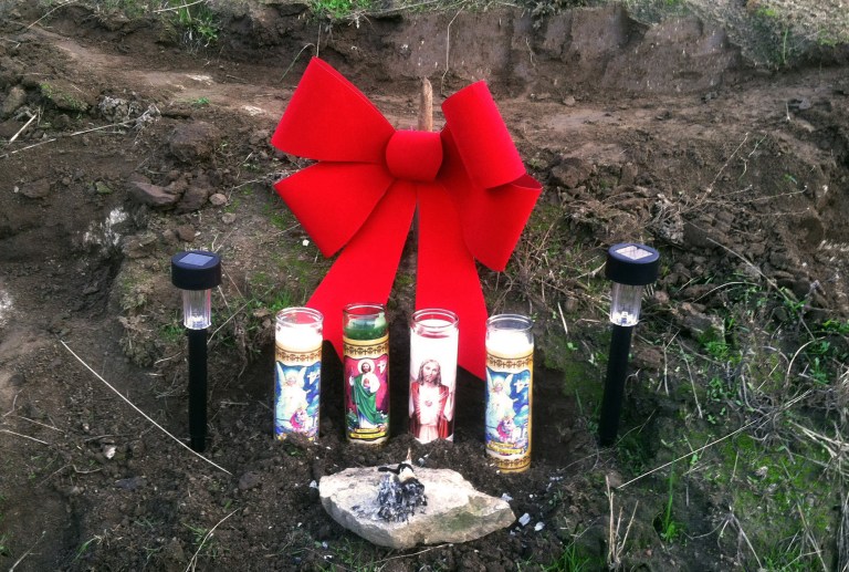   This Sunday, Dec. 9, 2012, photo shows a makeshift memorial on the Tule River Indian Reservation near Porterville, Calif. Authorities are piecing together what led a man to kill his mother and two uncles, and shoot his three children before being killed in a shootout with police on Saturday. The violence shook the tiny Tule River Indian Reservation, home to 800 residents and high poverty. (AP Photo/The Fresno Bee, Lew Griswold) LOCAL PRINT OUT (VISALIA TIMES-DELTA, REEDY EXPONENT, KINGBURG RECORDER, SELMA ENTERPRISE, HANFORD SENTINEL, PORTERVILLE RECORDER, MADERA TRIBUNE, THE BUSINESS JOURANL FRENSO); LOCAL TV OUT (KSEE24, KFSN30, KGE47, KMPH26)  