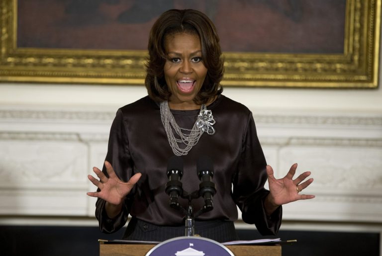 First lady Michelle Obama gestures while speaking in the State Dining Room of the White House in Washington, Wednesday, Jan. 15, 2014, where she hosted a screening of 