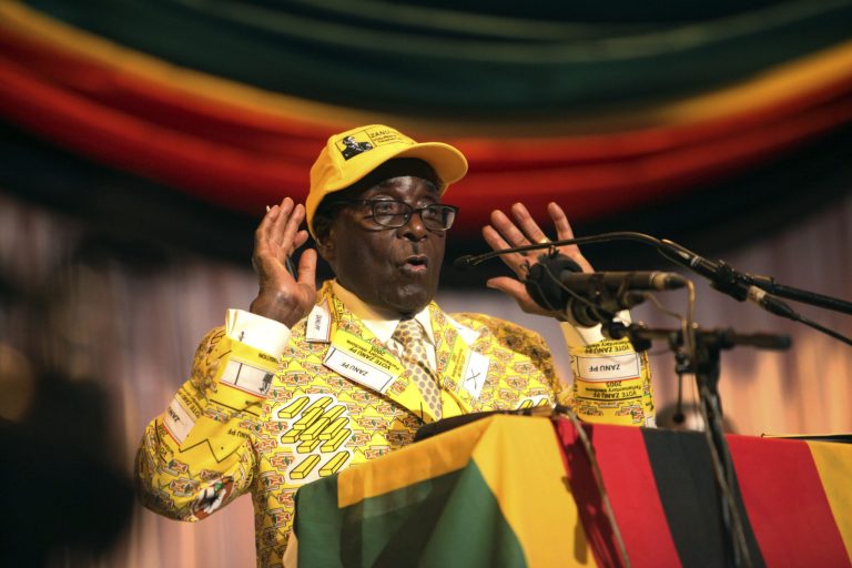   Zimbabwean President Robert Mugabe delivers his speech at his party's 13th annual conference, in Gweru about 250 Kilometres south west of the capital Harare, Friday, Dec. 7, 2012 .Zimbabwe president's loyalists have converged for an annual party convention in the provincial city of Gweru, hoping to map out a winning election strategy to end a conflict-ridden four-year-old coalition. President Robert Mugabe said in the state media Friday the convention should prepare for a convincing victory 