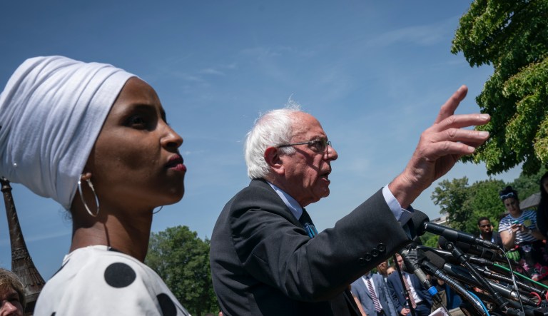 Democratic presidential candidate, Sen. Bernie Sanders, I-Vt., center, joined at left by Rep. Ilhan Omar, D-Minn., announces legislation to cancel all student debt, at the Capitol in Washington, Monday, June 24, 2019. Sanders called the student debt burden in this country the absurdity of sentencing an entire generation, the millennial generation, to a lifetime of debt for the crime of doing the right thing.  
