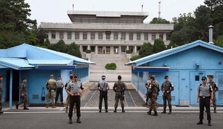 A North Korean soldier defecting from his country found cover in the Joint Security Area inside the Demilitarized Zone, the 2.5-mile-wide strip of land that separates North and South Korea. (Jung Yeon-Je/Pool Photo via AP, File)