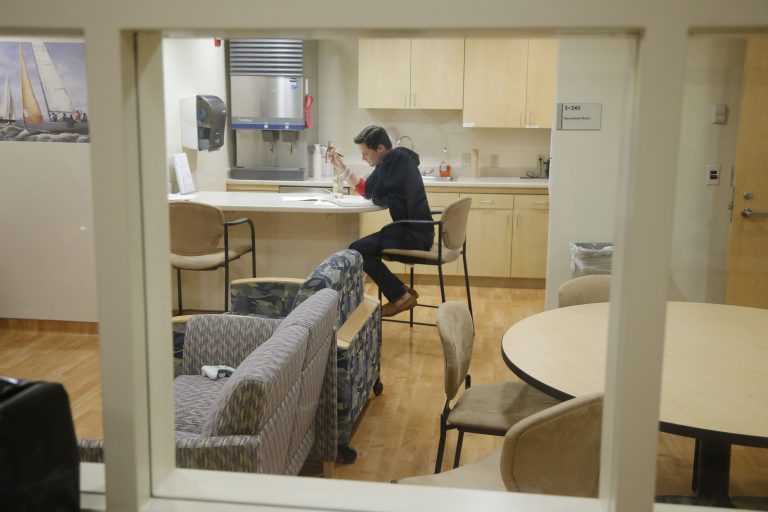 FILE - This Jan. 14, 2014 file photo shows Daniel Bennett quarantined in an isolation unit at the National Institute of Health (NIH) in Bethesda, Md., during research for a better flu vaccine. The NIH is preparing to care for an American doctor who was exposed to the Ebola virus while volunteering in Sierra Leone. As early as Sunday, Sept. 28, 2014, the physician is expected to be admitted to the same special isolation unit at NIH's hospital out of what the agency called 