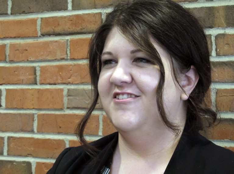 In this June 26, 2014 photo, Rachael Stafford, Rocky Mountain Americans with Disability Act Center project director, talks at a conference center in Pierre, S.D., during a training session on ADA compliance. (AP/Nora Hertel)
