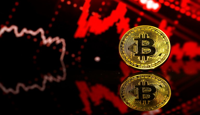 A coin representing Bitcoin cryptocurrency in the U.K.