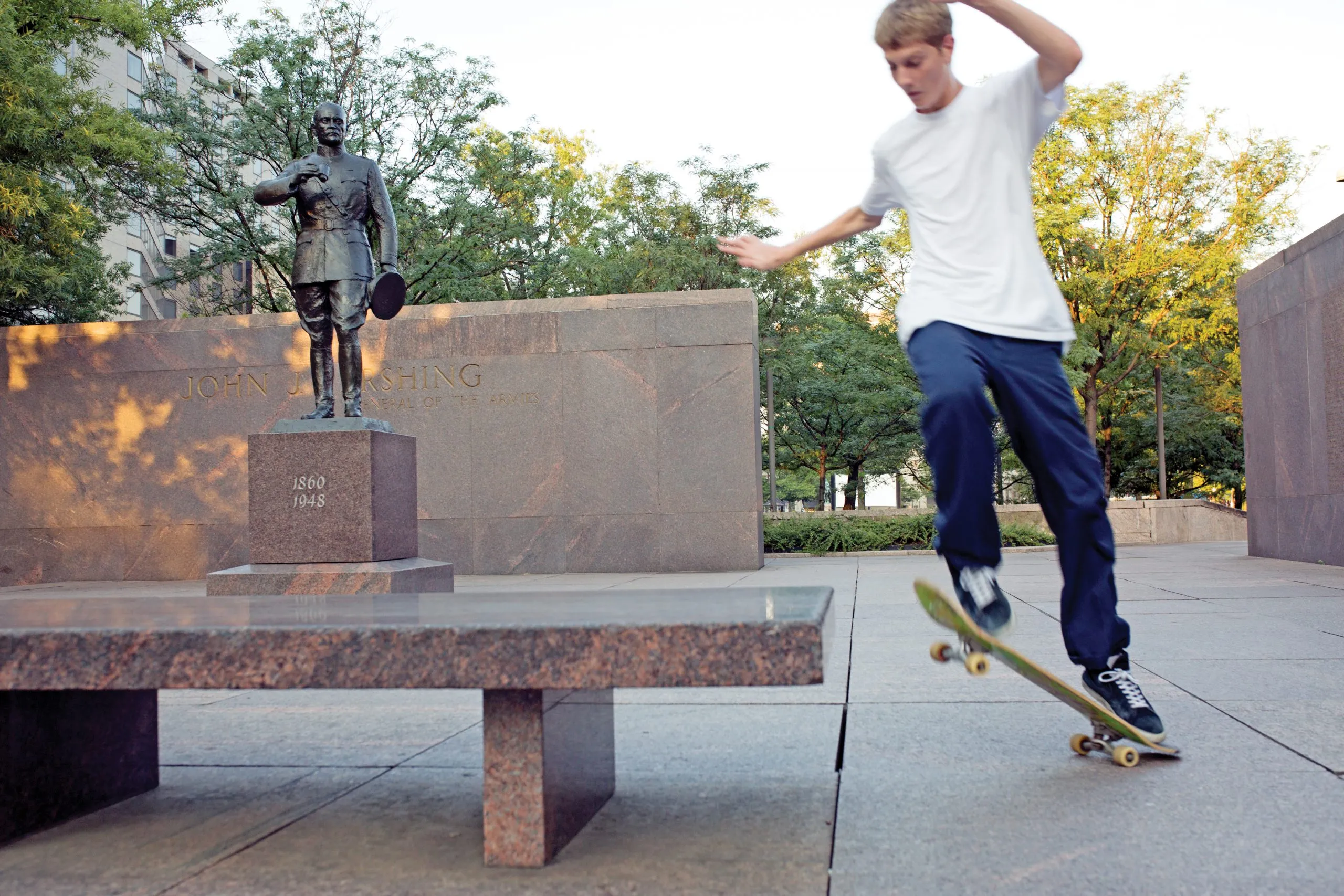 On a recent weekday evening, a young man practices skateboarding tricks in front of Robert Winthrop White’s statue of Gen. John ‘Black Jack’ Pershing—part of the Pershing memorial in the southeast corner of Pershing Park.