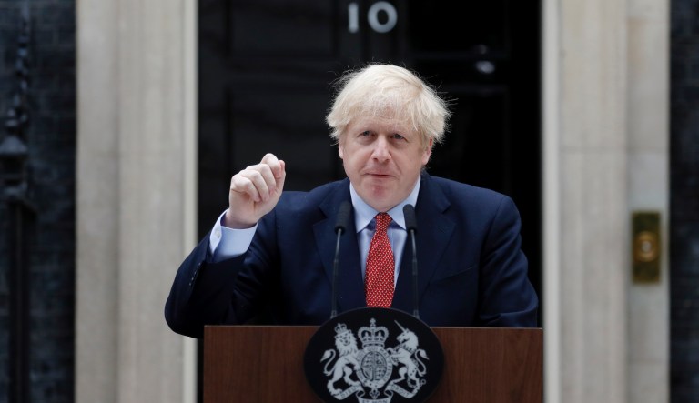 Britain's Prime Minister Boris Johnson gestures as he speaks during a press conference on the third and final day of the G-7 summit in Biarritz, France Monday, Aug. 26, 2019.