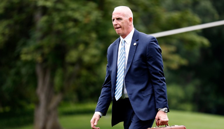 Schiller makes $165,000 per year, which is significantly lower than the $294,000 he earned working for Trump and running his own security firm. (AP Photo/Alex Brandon)