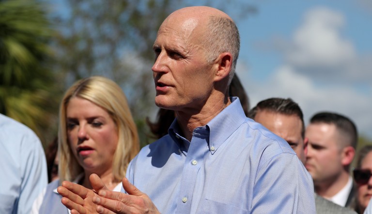 Florida Gov. Rick Scott's office reportedly knew ahead of time that students wanted to meet with the governor the same day he was to attend a funeral. So, to accommodate the teens, and to avoid scheduling conflicts, Scott's staff reportedly included the activists on his schedule after the funeral ended. But some students came anyway. (Amy Beth Bennett/South Florida Sun-Sentinel via AP)