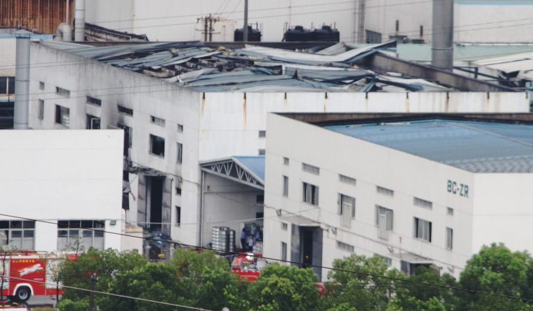This photo released by China's Xinhua News Agency shows the damaged workshop following an explosion at an eastern Chinese automotive parts factory in Kunshan,  Jiangsu Province Saturday, Aug. 2, 2014. Dozens of people were killed Saturday by the explosion at the factory that supplies General Motors, state media reported. (AP Photo/Xinhua, Zhu Guigen) NO SALES