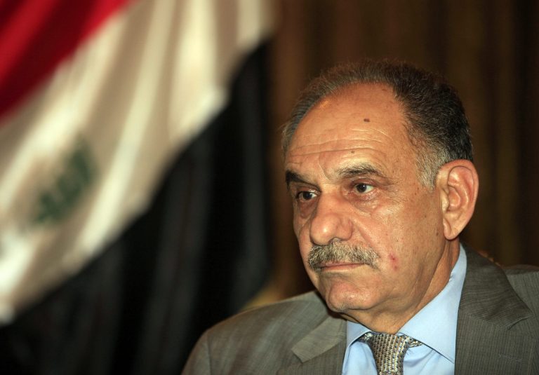 FILE - In this May 1, 2013 file photo, Iraqi Deputy Prime Minister Saleh al-Mutlaq gives an interview to The Associated Press in Baghdad, Iraq. An Iraqi lawmaker says the country's Deputy Prime Minister, Saleh al-Mutlaq  escaped an assassination attempt in which militants dressed as soldiers opened fire at his convoy west of Baghdad. The attack was the latest in Iraq as the country heads toward crucial parliamentary elections on April 30. (AP Photo/Karim Kadim, File)