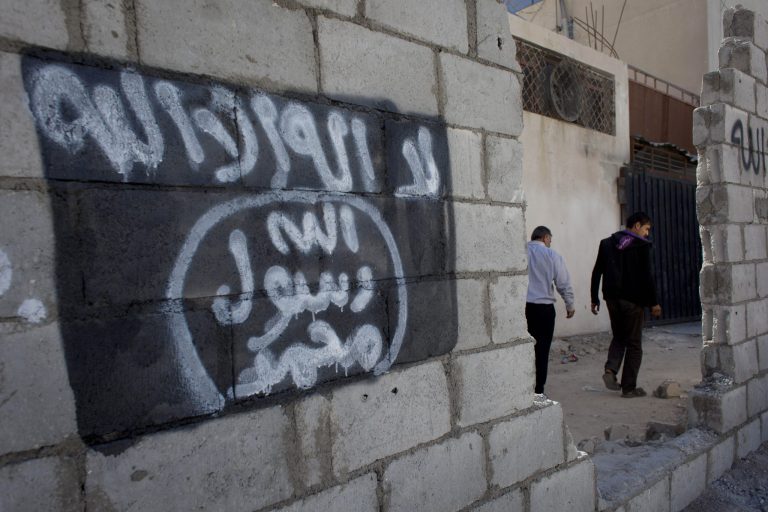 Two Iraqi-born Palestinians who came to the United States as refugees have been arrested on federal terrorism charges (AP Photo/Nasser Nasser)