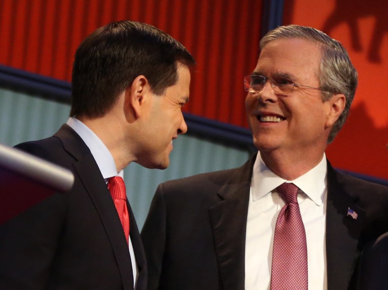 It's not clear that Jeb Bush and Marco Rubio were disagreeing, much less fighting about Common Core. (AP Photo)