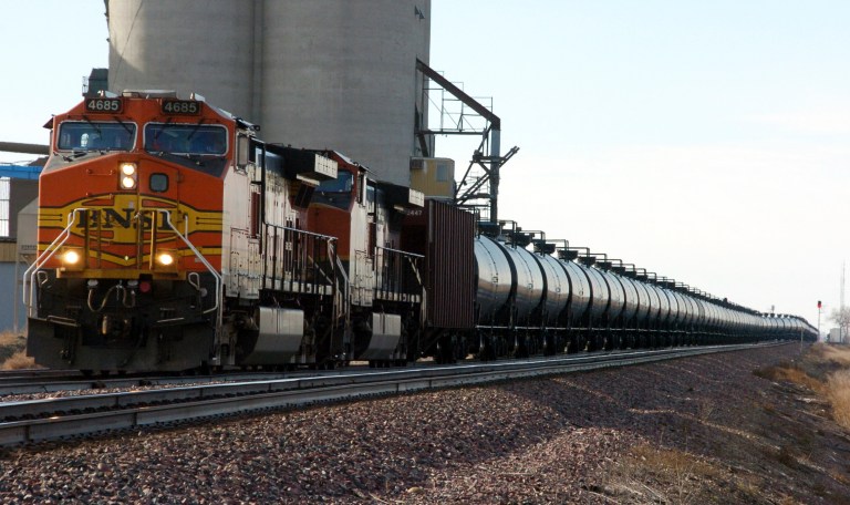 FILE - In this Nov. 6, 2013, file photo, a BNSF Railway train hauls crude oil near Wolf Point, Mont. Montana officials intend to release details next week on oil trains passing through the state despite efforts by railroads to keep the information from the public. (AP Photo/Matthew Brown, File)