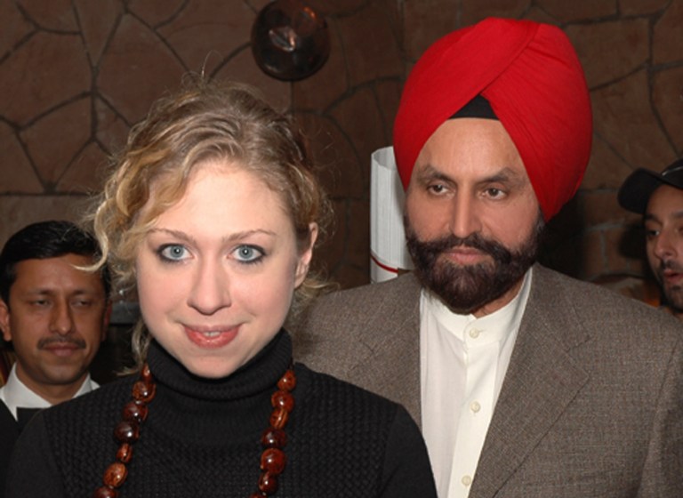 FILE- In this Jan. 3, 2006 file photo, Chelsea Clinton, daughter of former US President Bill Clinton, stands with businessman Sant Singh Chatwal during a private visit, in New Delhi, India. Chatwal, a hotel executive who raised at least $100,000 for Secretary of State Hillary Rodham Clinton's 2008 presidential campaign against Barack Obama, on Thursday, April 17, 2014 pleaded guilty in New York to witness tampering and conspiracy to evade campaign finance laws. (AP Photo/File)