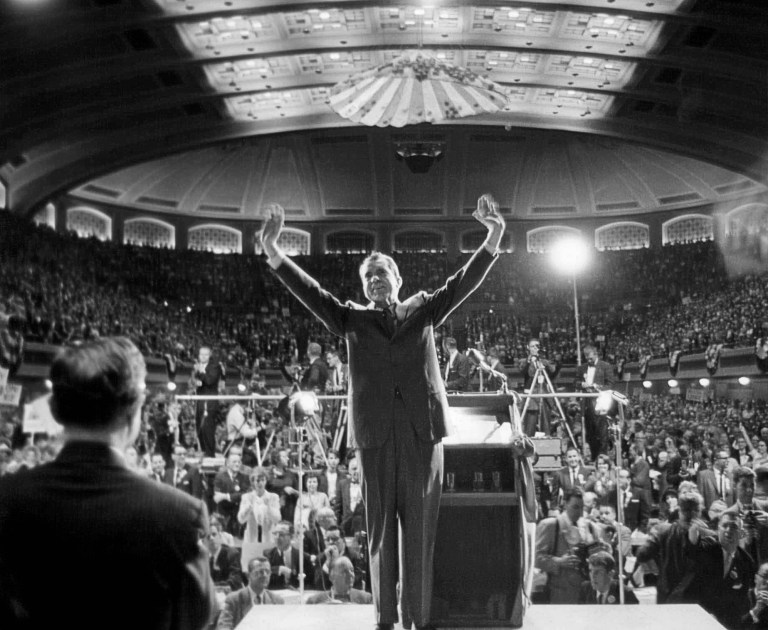 In this Oct. 6, 1960, file photo, Republican presidential nominee and Vice President Richard M. Nixon acknowledges cheers during a campaign speech at Public Hall in Cleveland. Cleveland is hosting the Republican National Convention from Monday through Thursday, July 18 to 21, 2016. (AP Photo)