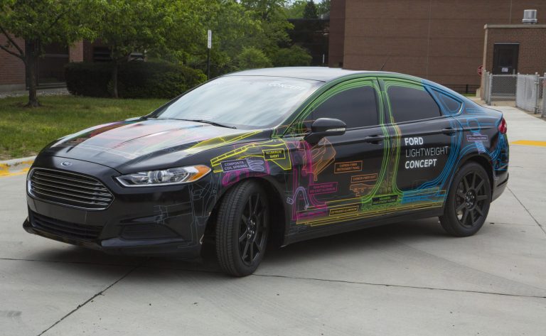 This undated photo provided by Ford Motor Co. shows a lightweight Fusion sedan that was unveiled Tuesday, June 3, 3014. The prototype is 800 pounds lighter than a regular Fusion thanks to more use of aluminum and other materials. (AP Photo/Ford Motor Co.)