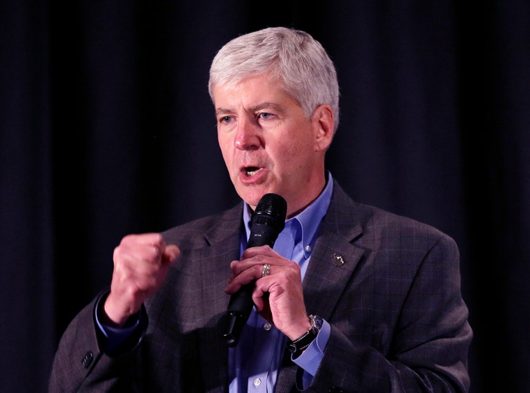 Michigan Gov. Rick Snyder has been criticized by many over his handling of the situation, including Democratic presidential candidate Hillary Clinton. (AP Photo/Carlos Osorio)