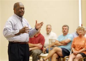 Cain in race ‘no matter what’ happens in Iowa
